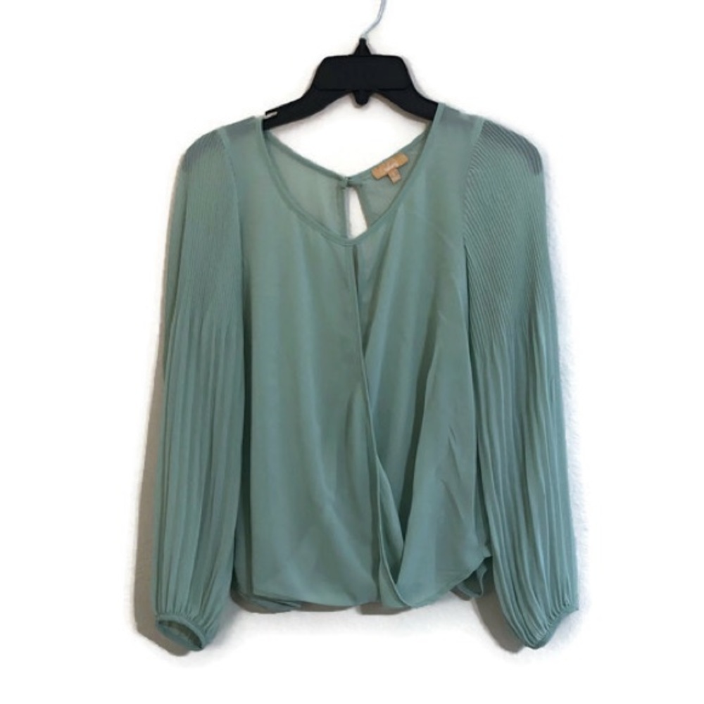 Sheer turquoise blouse